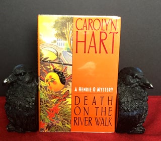 Item #1864 DEATH ON THE RIVER WALK; A Henry O. Mystery. Carolyn Hart