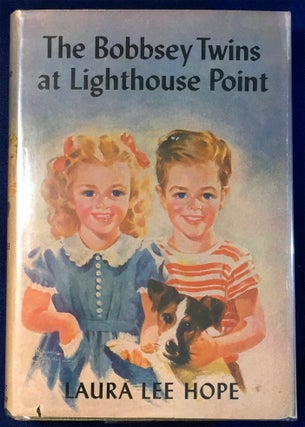 Item #2800 THE BOBBSEY TWINS AT LIGHTHOUSE POINT. Laura Lee Hope
