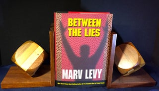 Item #3340 BETWEEN THE LIES. Marv Levy