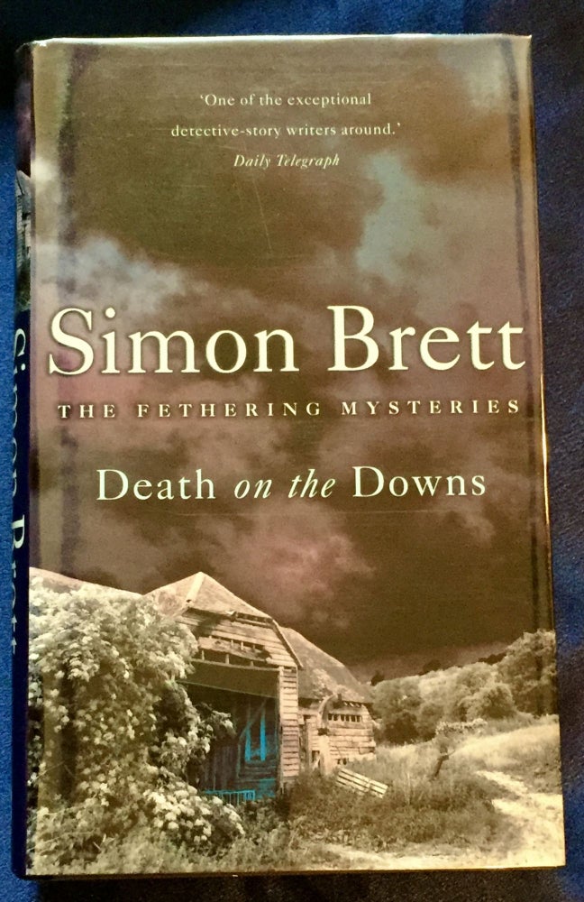 Item #5727 DEATH ON THE DOWNS ; A Fethering Mystery. Simon Brett.