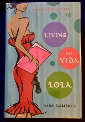 Item #6743 LIVING THE VIDA LOLA ; A Lola Cruz Mystery. Misa Ramirez