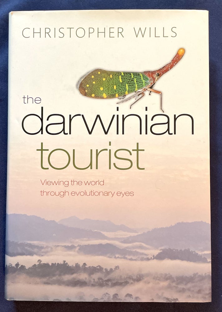 Item #7219 THE DARWINIAN TOURIST; Viewing the World through Evolutionary Eyes / With Photographs by the Author. Christopher Wills.