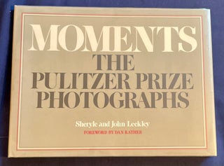 MOMENTS; The Pulitzer Prize Photographs / Foreword by Dan Rather
