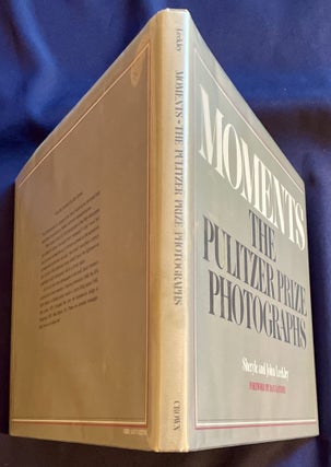 MOMENTS; The Pulitzer Prize Photographs / Foreword by Dan Rather