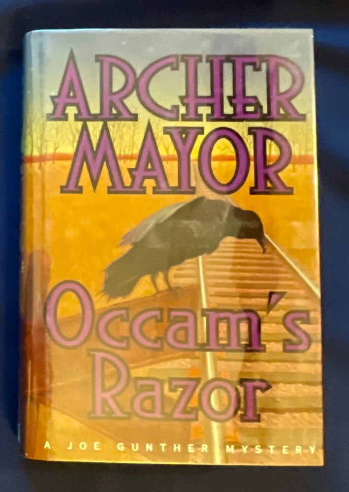 Item #8822 OCCAMS RAZOR. Archer Mayor.