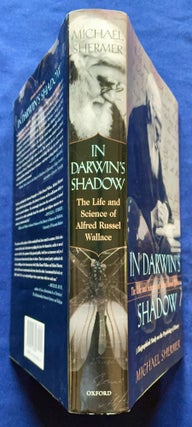 IN DARWIN'S SHADOW; The Life and Science of Alfred Russel Wallace / A Biographical Study on the Psychology of History